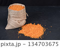 A bag of lentils on a black background 134703675