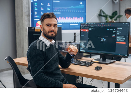 Man is in the modern office, one person 134704448
