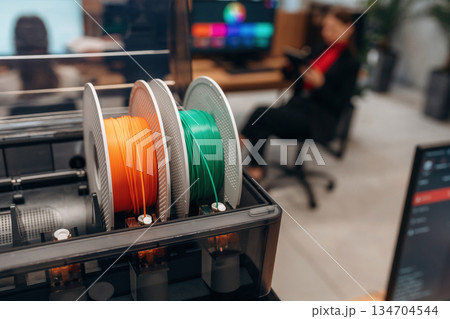 Plastic for a 3D printer in the office, close up view 134704544