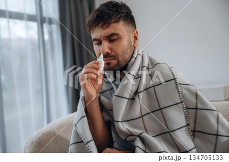 Sick man is feeling bad at home Sick man is feeling bad at home 134705133