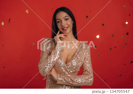 Young elegant woman is against background Young elegant woman is against background 134705547