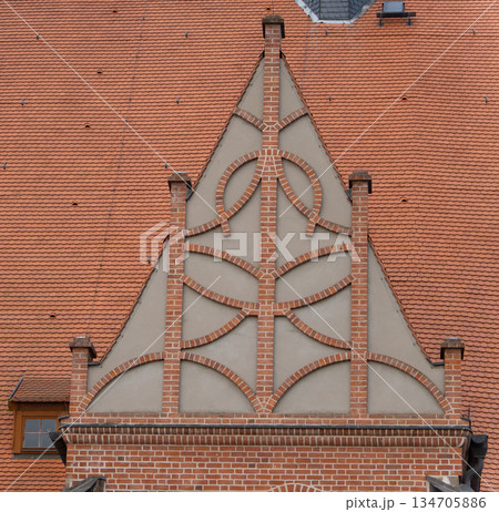Dessau, Germany. December 23, 2025. A decorative brick gable against Dessau, Germany. December 23, 2025. A decorative brick gable against 134705886