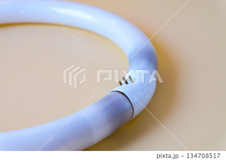 A broken and damaged fluorescent  light bulbs, recycling. 134708517