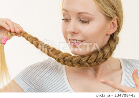 Blonde girl with braid hair 134709445
