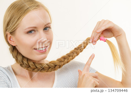 Blonde young woman with braid hair 134709446