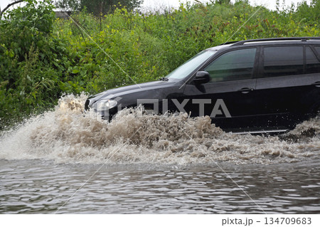 SUV Driving Fast Floods 134709683