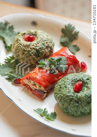 Georgian pkhali and stuffed pepper appetizer 134710281