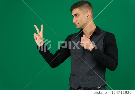 Middle-aged man at home counts tasks on fingers thinking over life choices planning ahead. Young adult guy on sofa ponders decisions hesitates evaluating key goals tracking progress with hand numbers Middle-aged man at home counts tasks on fingers thinking over life choices planning ahead. Young adult guy on sofa ponders decisions hesitates evaluating key goals tracking progress with hand numbers 134711920