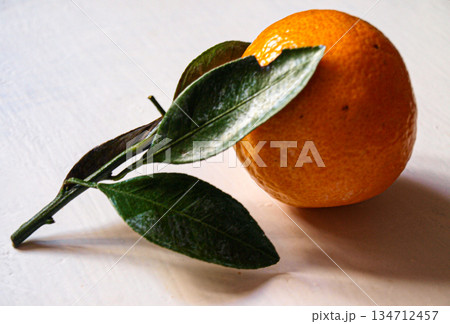Ripe New Year's tangerine with leaves 134712457