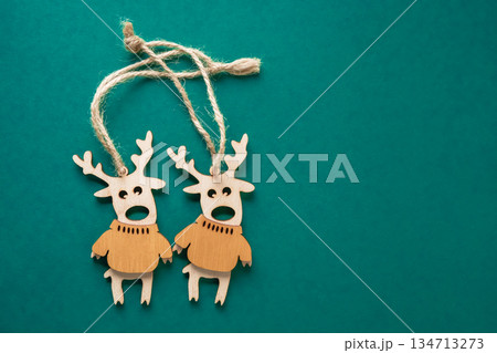 Reindeer Christmas decoration isolated on a green background 134713273