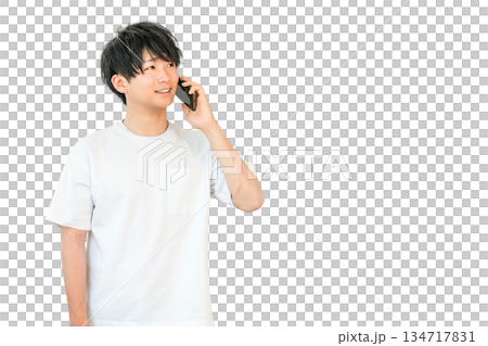 Young Asian man making a phone call on his smartphone Young Asian man making a phone call on his smartphone 134717831