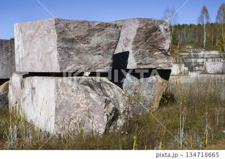 Huge cubic and geometric stone shapes in abandoned marble quarry near village of Peteni in Siberia 134718665