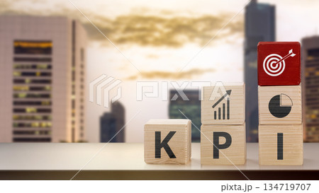Stacked wooden cube blocks spelling out KPI with target, graph, and pie chart icons. Concept of Key Performance Indicator Stacked wooden cube blocks spelling out KPI with target, graph, and pie chart icons. Concept of Key Performance Indicator 134719707