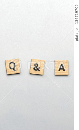 Top shot of wooden cubes spelling out the common abbreviation of Q And A, meaning questions and answers, centered on a white textured background. Concept of Questions and Answers Top shot of wooden cubes spelling out the common abbreviation of Q And A, meaning questions and answers, centered on a white textured background. Concept of Questions and Answers 134719709