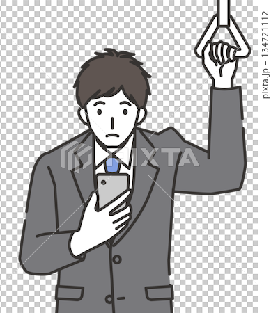 Office worker looking at smartphone on commuter train 134721112