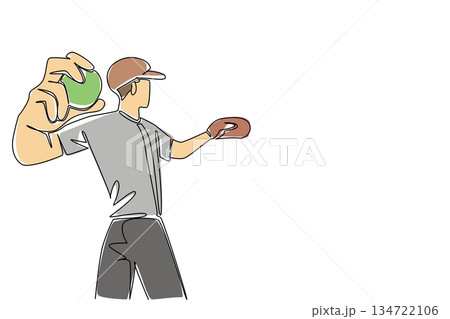 Continuous line drawing of male player in a cap and glove, mid throw with a softball, capturing the quick and precise motion of the game. Pitching green softball celebrate World Softball Day event Continuous line drawing of male player in a cap and glove, mid throw with a softball, capturing the quick and precise motion of the game. Pitching green softball celebrate World Softball Day event 134722106