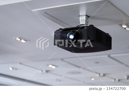 ceiling projector in conference room for presentation 134722700