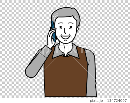 正面向き。スマホで電話するシャツとベストを着た高齢男性。 正面向き。スマホで電話するシャツとベストを着た高齢男性。 134724097