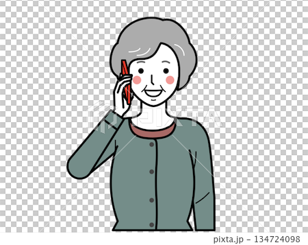 正面向き。スマホで電話をするカーディガンを着た高齢女性。 134724098