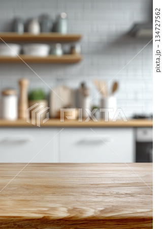 Polished Wooden Table with Defocused Minimalist Kitchen Background 134727562