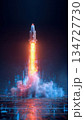 Futuristic Rocket Launch from Digital Grid in Vibrant Orange-Blue Tones 134727730