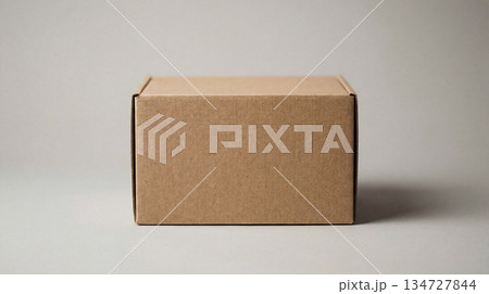 Cardboard box on neutral studio background. Minimal box packaging for ecommerce delivery, for Black Friday sale, Cyber Monday promo, Christmas shipping, box mockup with copy space, clean brand concept Cardboard box on neutral studio background. Minimal box packaging for ecommerce delivery, for Black Friday sale, Cyber Monday promo, Christmas shipping, box mockup with copy space, clean brand concept 134727844