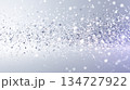白いキラキラと輝く光のパーティクル 134727922