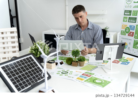 Businessman is planning for esg environmental social corporate governance projects Businessman is planning for esg environmental social corporate governance projects 134729144