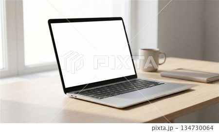 Mockup image of laptop with blank white screen on wooden desktop with coffee cup and other items 134730064