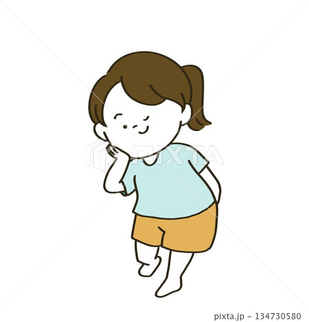 頬に手を当ててウインクする女の子 134730580