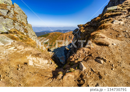 Autumn hiking trail on the ridge of Low Tatras mountains, Slovakia. 134730791