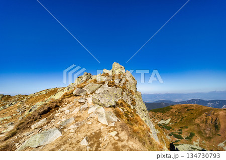 Autumn hiking trail on the ridge of Low Tatras mountains, Slovakia. 134730793