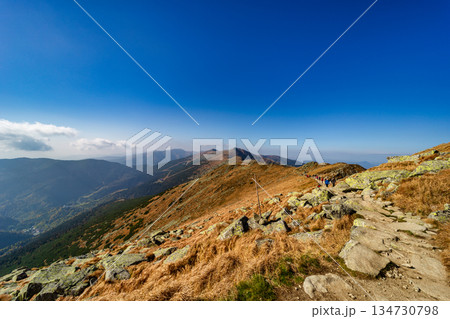 Autumn hiking trail on the ridge of Low Tatras mountains, Slovakia. 134730798
