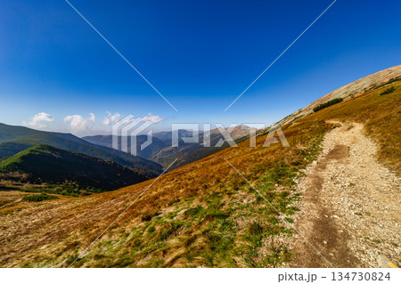 Autumn hiking trail on the ridge of Low Tatras mountains, Slovakia. 134730824