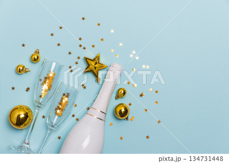 New Year 2026 Celebration with Champagne and Gold Decorations 134731448