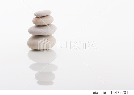Zen Stones Stacked in Balance on White Background 134732012