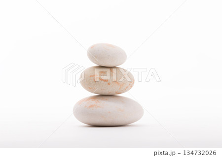 Balanced Stack of River Rocks Against White Background Balanced Stack of River Rocks Against White Background 134732026
