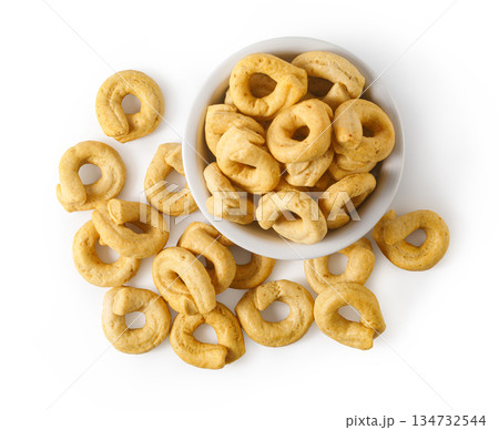 Taralli ring crackers in bowl and scattered Taralli ring crackers in bowl and scattered 134732544