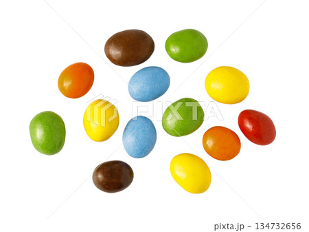Colorful chocolate candies scattering on white background 134732656