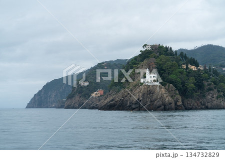 Lighthouse Portofino on Rocky Cliff Above the Mediterranean Sea, Liguria 134732829
