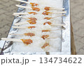Hot maple syrup on a stick in the snow 134734622