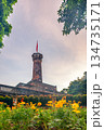 Hanoi Flag Tower with Yellow Flowers in Bloom 134735171