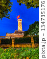 Hanoi Flag Tower with Yellow Flowers in Bloom 134735176