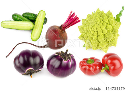 Assortment of fresh organic vegetables isolated on white background. Assortment of fresh organic vegetables isolated on white background. 134735179