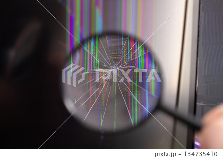 Magnifying glass analyzing a shattered digital screen showing colorful pixel lines, representing severe electronic device damage, critical technical failure, and urgent repair services Magnifying glass analyzing a shattered digital screen showing colorful pixel lines, representing severe electronic device damage, critical technical failure, and urgent repair services 134735410