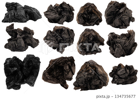 crumpled black garbage bag isolated on white background crumpled black garbage bag isolated on white background 134735677