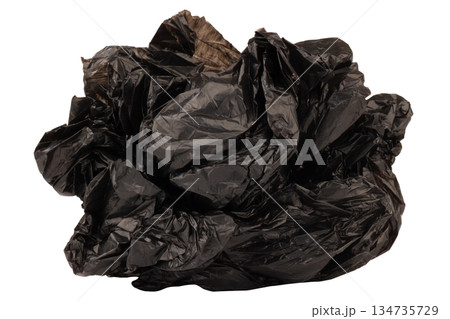 crumpled black garbage bag isolated on white background crumpled black garbage bag isolated on white background 134735729