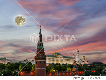Night view of the Moscow Kremlin, Russia (the most popular view). Against the background of a beautiful sky with the moon Night view of the Moscow Kremlin, Russia (the most popular view). Against the background of a beautiful sky with the moon 134736919