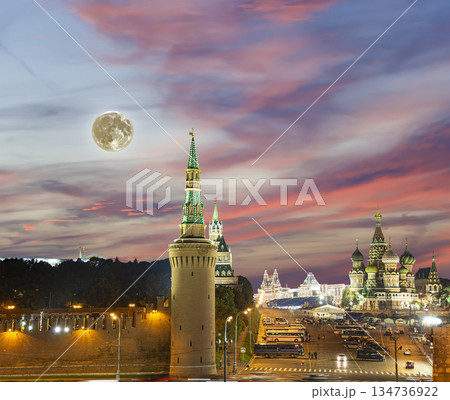 Night view of the Moscow Kremlin, Russia (the most popular view). Against the background of a beautiful sky with the moon 134736922