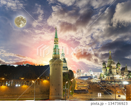 Night view of the Moscow Kremlin, Russia (the most popular view). Against the background of a beautiful sky with the moon 134736923